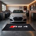 Audi RS4 garage floor mat, 5x7 ft (60x87"), bold red and white RS4 logo on black background with dimensions shown.