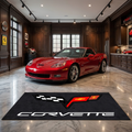 Corvette C6 garage floor mat, 5x7 ft (60x87"), C6 crossed flags emblem and CORVETTE wordmark in red gold black and white on charcoal background with dimensions shown.