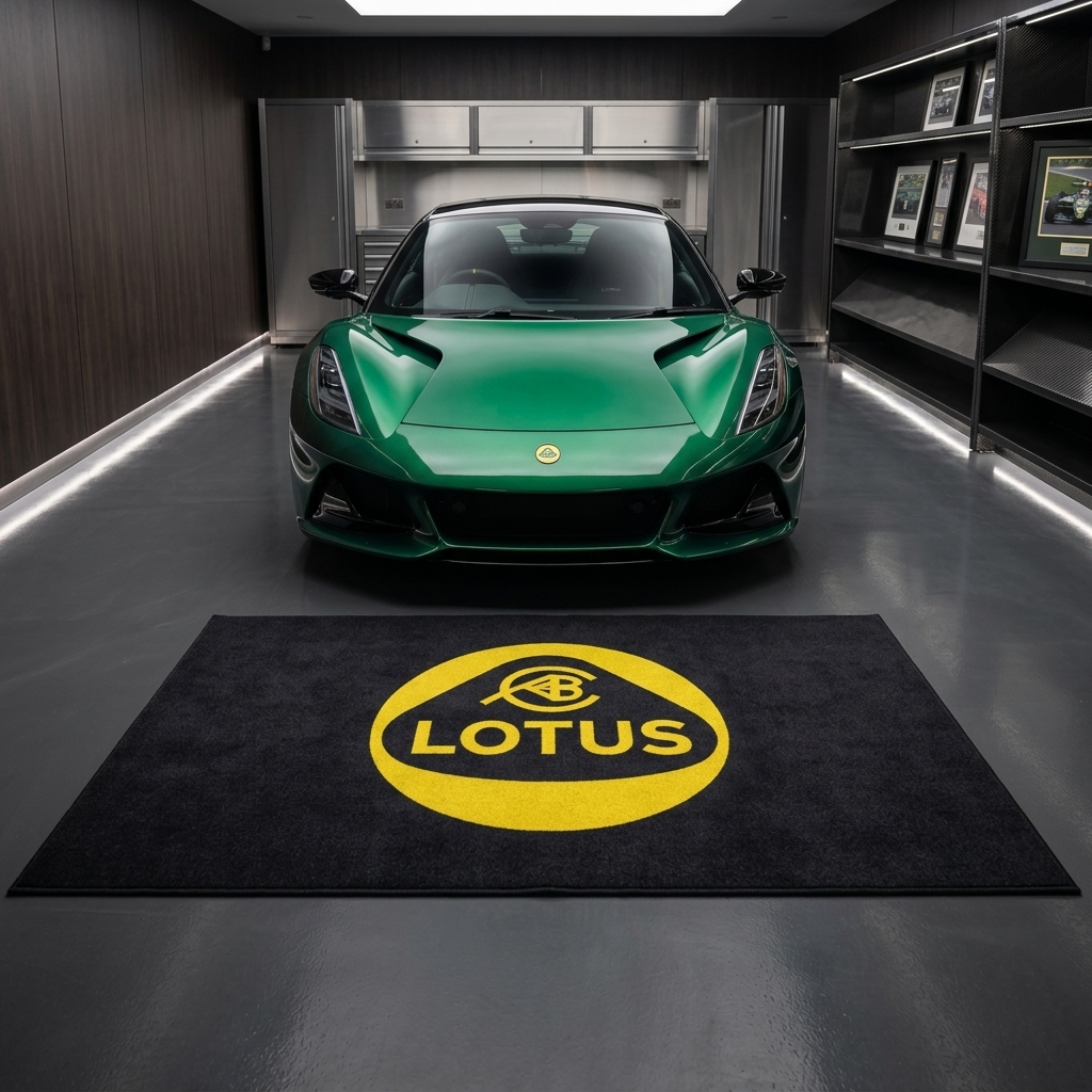 Lotus Cars garage floor mat, 5x7 ft (60x87"), bold yellow Lotus roundel and wordmark on black background with dimensions shown.