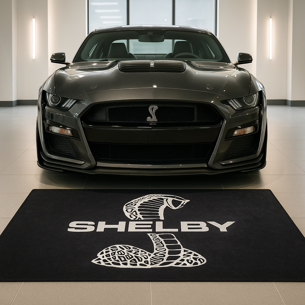 Large Mustang Shelby Cobra logo floor rug, 5x7 feet, with non-slip backing, featuring the iconic cobra snake emblem in a professional garage.